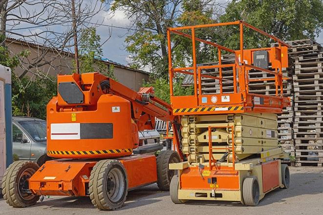 forklift transporting goods in a large warehouse in Blountville, TN